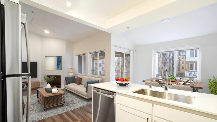 Kitchen with stainless appliances and bar seating