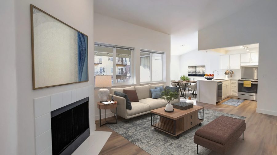 Living room with fireplace and vaulted ceiling